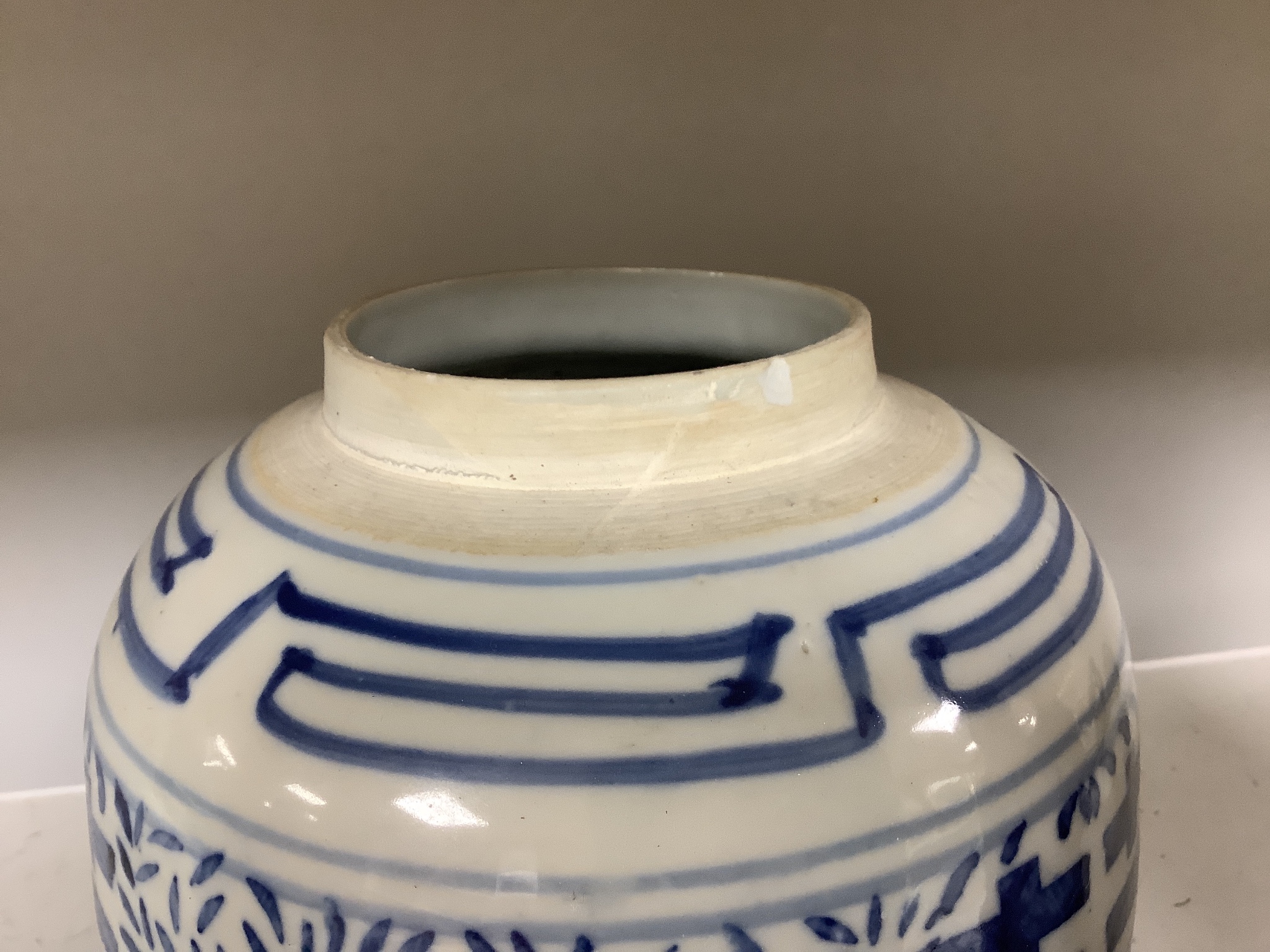 Four Chinese blue and white ginger jars, one with cover, tallest 23cm